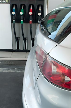 simsearch:6105-05395912,k - Gray car at a gas station. Stock Photo - Budget Royalty-Free & Subscription, Code: 400-04423110