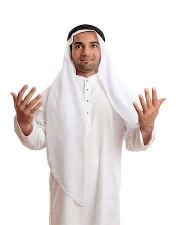 A happy arab middle eastern man with hands outstretched in praise and worship.  White background. Stock Photo - Budget Royalty-Free & Subscription, Code: 400-04423649