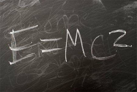 simsearch:625-01250891,k - Albert Einsteins famous matematical equation e=mc2 written on a chalkboard. Stock Photo - Budget Royalty-Free & Subscription, Code: 400-04423705