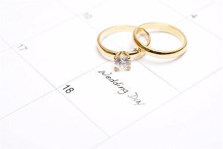 A note on a calendar sets a reminder for the wedding day. Photographie de stock - Aubaine LD & Abonnement, Code: 400-04423719