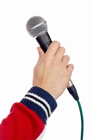 simsearch:400-06954069,k - Hand holding a microphone over a white background Photographie de stock - Aubaine LD & Abonnement, Code: 400-04434227