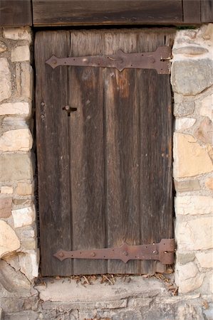 simsearch:400-04990381,k - Old wooden door in stonewall Stock Photo - Budget Royalty-Free & Subscription, Code: 400-04434306