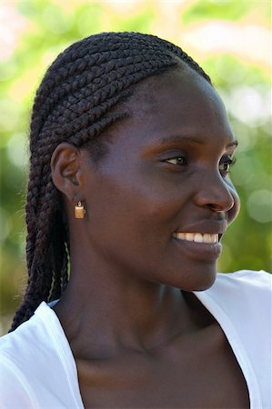 Young african woman, Zimbabwe, no makeup, smiling Stock Photo - Budget Royalty-Free & Subscription, Code: 400-04434982