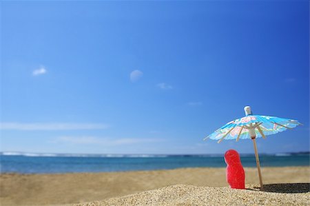 spanishalex (artist) - Jelly baby under parasol on the beach Stock Photo - Budget Royalty-Free & Subscription, Code: 400-04435945