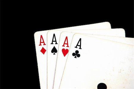 queen of hearts playing card - Four Aces against a black back ground Stock Photo - Budget Royalty-Free & Subscription, Code: 400-04437795