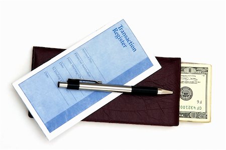 simsearch:400-08408451,k - A Check book, transaction register and some money against a white background Stock Photo - Budget Royalty-Free & Subscription, Code: 400-04437909