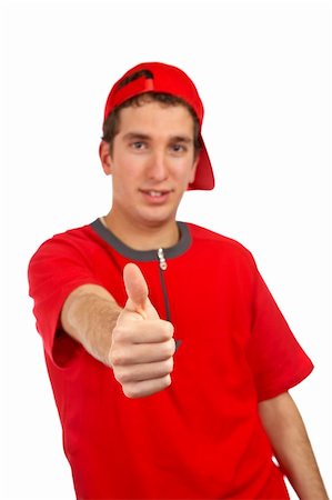 simsearch:400-04335148,k - Smiling handsome boy with red t-shirt over a white background. Success gesture and finger on focus. Foto de stock - Super Valor sin royalties y Suscripción, Código: 400-04438100