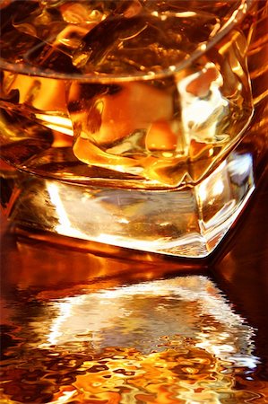 simsearch:400-04558755,k - Backlit whiskey in glass tumbler with reflection Stock Photo - Budget Royalty-Free & Subscription, Code: 400-04430745