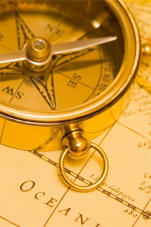 Old style brass compass on antique  map Stock Photo - Budget Royalty-Free & Subscription, Code: 400-04430867