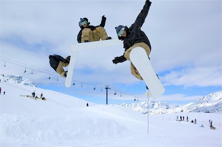 simsearch:400-03985663,k - a serie of a snowboarder jumping high through a blue sky Stock Photo - Budget Royalty-Free & Subscription, Code: 400-04431104