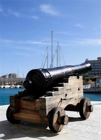 sentinel - Medieval authentic cannon on the coast in Mediterranean, Malta Stock Photo - Budget Royalty-Free & Subscription, Code: 400-04433931