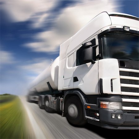 truck driving on country-road/motion blur Foto de stock - Super Valor sin royalties y Suscripción, Código: 400-04444332
