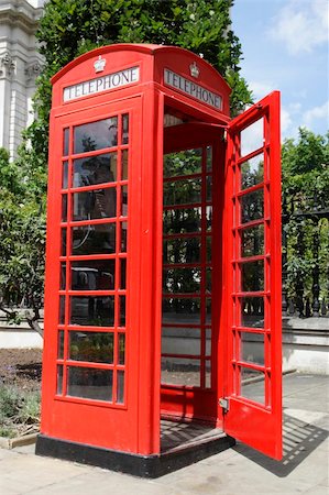 red call box - red telephone box with the door open along cannon street london Stock Photo - Budget Royalty-Free & Subscription, Code: 400-04447772