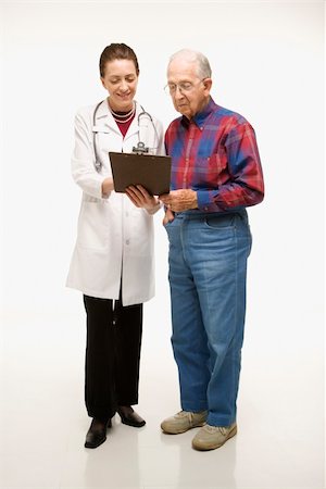 Mid-adult Caucasian female doctor showing papers to elderly Caucasian male. Stock Photo - Budget Royalty-Free & Subscription, Code: 400-04449868