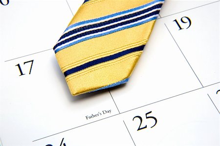 family planning - A tie and calendar showing father's day. Photographie de stock - Aubaine LD & Abonnement, Code: 400-04440358