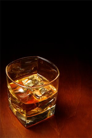 simsearch:400-04558755,k - Whiskey in light pool on brown table with copyspace Stock Photo - Budget Royalty-Free & Subscription, Code: 400-04441715