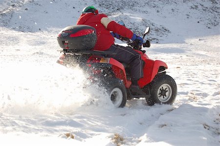 Quad in mountain snow Stock Photo - Budget Royalty-Free & Subscription, Code: 400-04443333
