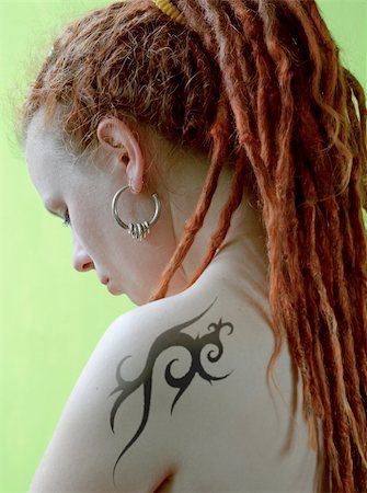 Tatooed girl close up. Stock Photo - Budget Royalty-Free & Subscription, Code: 400-04454330