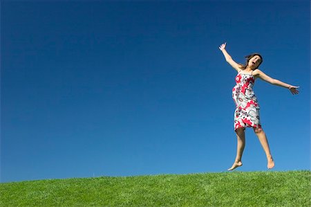 simsearch:400-03934248,k - Happy woman on a beautiful green meadow Stock Photo - Budget Royalty-Free & Subscription, Code: 400-04454936
