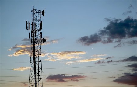 Communications tower silhouetted against a late evening sky. Stock Photo - Budget Royalty-Free & Subscription, Code: 400-04459109