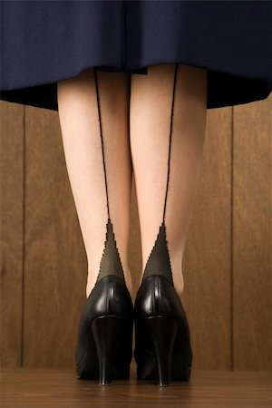 stocking feet - Close-up shot of Caucasian female in skirt with black heels. Stock Photo - Budget Royalty-Free & Subscription, Code: 400-04450070