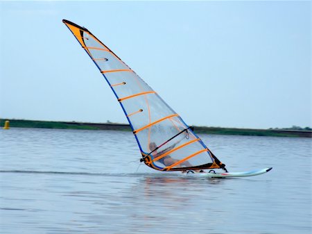 simsearch:400-03992760,k - windsurfer on waves of a gulf in the afternoon Stock Photo - Budget Royalty-Free & Subscription, Code: 400-04453629
