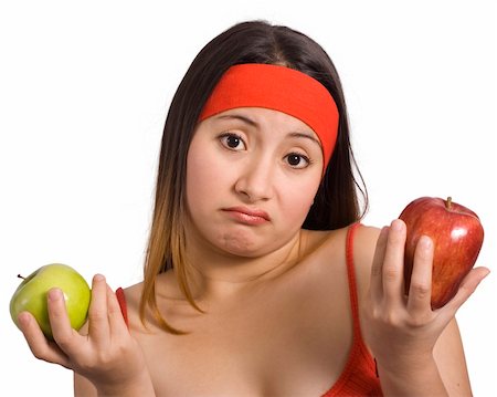 simsearch:400-05106591,k - sporty woman cannot choose between green and red apple Stock Photo - Budget Royalty-Free & Subscription, Code: 400-04453981