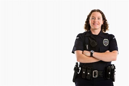 female police officer happy - Portrait of mid adult Caucasian policewoman standing with arms crossed looking at viewer smiling. Photographie de stock - Aubaine LD & Abonnement, Code: 400-04468890