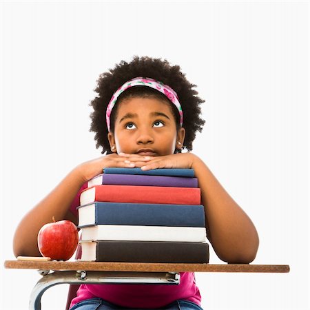 simsearch:400-05012508,k - African American girl sitting in school desk with large stack of books looking bored. Foto de stock - Super Valor sin royalties y Suscripción, Código: 400-04469050