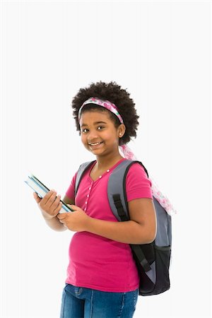simsearch:400-05012508,k - African American girl holding books and wearing backpack smiling at viewer. Foto de stock - Super Valor sin royalties y Suscripción, Código: 400-04469052