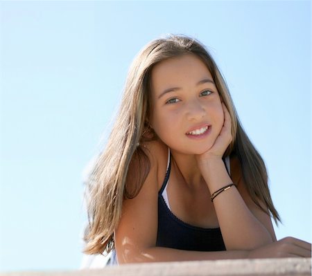 Asian teen girl against the sky Stock Photo - Budget Royalty-Free & Subscription, Code: 400-04469382