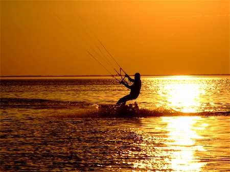 simsearch:400-03992760,k - Silhouette of a kitesurf on a gulf on a sunset 2 Stock Photo - Budget Royalty-Free & Subscription, Code: 400-04469393