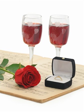 Preparing to propose her - with all the classic elements - rose, red wine, music and the ring (isolated, clipping path) Photographie de stock - Aubaine LD & Abonnement, Code: 400-04460975