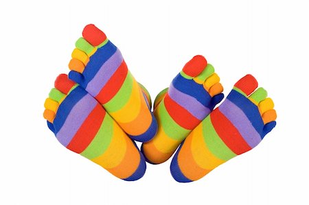 simsearch:400-04658893,k - Man and woman feets in funny socks touching (isolated) - concept for compatible soulmates, togetherness and fun Photographie de stock - Aubaine LD & Abonnement, Code: 400-04460993
