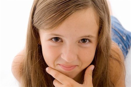 preteens fingering - portrait of smiling girl. Isolated on white. Stock Photo - Budget Royalty-Free & Subscription, Code: 400-04461566