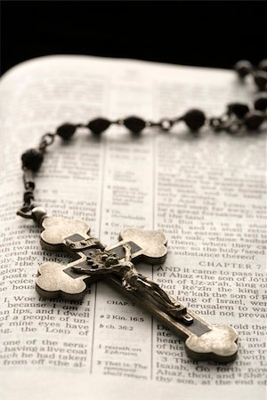 Rosary with crucifix lying on open Bible. Stock Photo - Budget Royalty-Free & Subscription, Code: 400-04476074