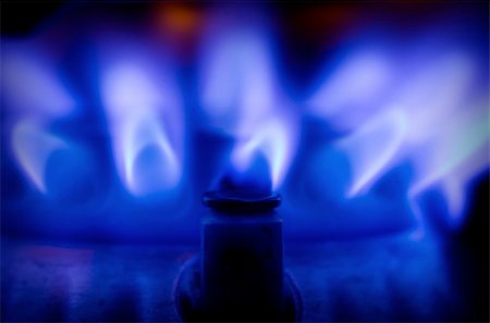 Blue gas flame on a stove Stock Photo - Budget Royalty-Free & Subscription, Code: 400-04476852