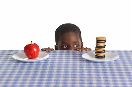 simsearch:400-05106591,k - A young African American boy gets ready for a snack - studio shot isolated on white. Stock Photo - Budget Royalty-Free & Subscription, Code: 400-04477162