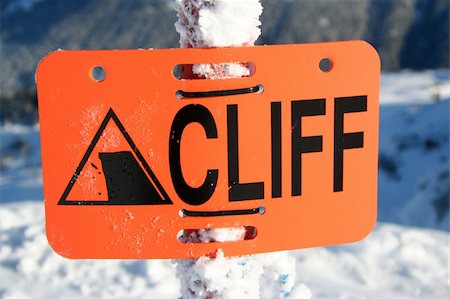 extreme skiing cliff - A sign at a ski hill warning skiers of a cliff ahead. Stock Photo - Budget Royalty-Free & Subscription, Code: 400-04478202