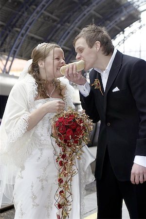 funny tuxedos - Newlyweds stopping for a snack. Stock Photo - Budget Royalty-Free & Subscription, Code: 400-04472721