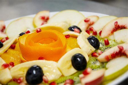 simsearch:400-05367726,k - Perfectly designed fresh juicy fruit salad on plate.  Close-up series. Shallow DOF. Stock Photo - Budget Royalty-Free & Subscription, Code: 400-04473690