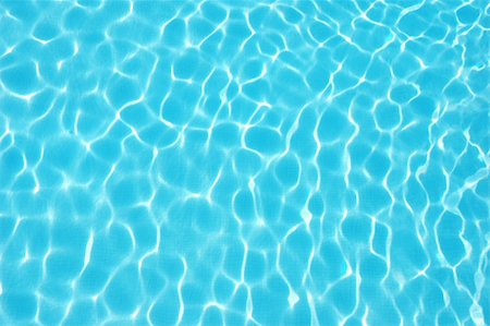 simsearch:400-04058760,k - Blue water wave pattern of a swimming pool Photographie de stock - Aubaine LD & Abonnement, Code: 400-04484237