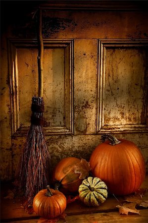 Halloween night/ Pumpkins, broom and gourds at the door ready for halloween Stock Photo - Budget Royalty-Free & Subscription, Code: 400-04484858