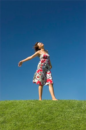 simsearch:400-03934248,k - Happy woman having fun on a beautiful green meadow Stock Photo - Budget Royalty-Free & Subscription, Code: 400-04486028