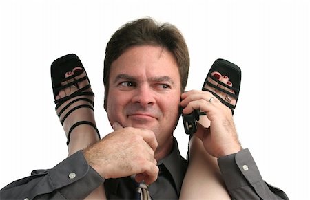 foot rings images - A man interrupting a workplace affair to  take a phone call. Stock Photo - Budget Royalty-Free & Subscription, Code: 400-04486179