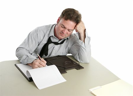 public servant - An office worker concentrating and taking notes. Stock Photo - Budget Royalty-Free & Subscription, Code: 400-04486197