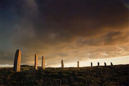 druid - Ring of Brodgar in dramatic evening light and cloudscape Stock Photo - Budget Royalty-Free & Subscription, Code: 400-04486671