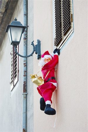 santa window - Santa Claus on the wall Stock Photo - Budget Royalty-Free & Subscription, Code: 400-04488709