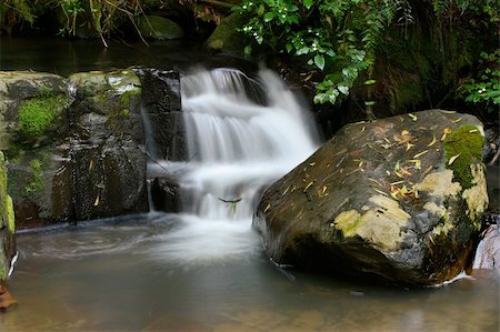 simsearch:400-05890122,k - Small waterfall in a mountain stream with moss covered rocks Stock Photo - Budget Royalty-Free & Subscription, Code: 400-04489434