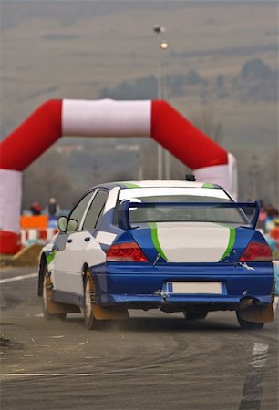 skid marks - Rally car during the race in a curve. Stock Photo - Budget Royalty-Free & Subscription, Code: 400-04482743